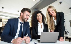 corporate employees smiling and working